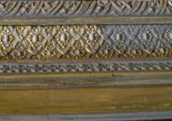 Dusty painting frame partially cleaned.